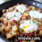Homestyle Meatloaf Hash 2 Leftover Bacon Wrapped Meatloaf transformed into one seriously delicious one pot breakfast in this Meatloaf Hash Recipe with potatoes, onions & eggs!