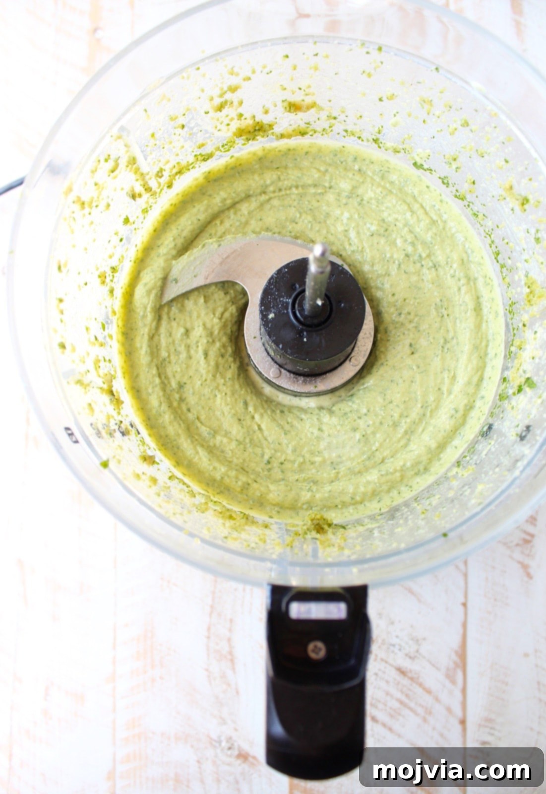 This healthy, vegan and gluten free Green Tahini Sauce Recipe is perfect for topping buddha bowls, chicken and fish, or serve it as a dip with veggies!