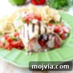 Grilled burritos, filled with fajita grilled chicken, veggies & cilantro lime rice