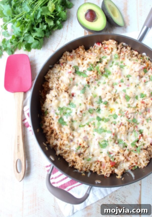 One Pan Zesty Turkey Taco Rice 6 Close-up of the finished One Pot Turkey Taco Rice Skillet, ready to be served with melted pepper jack cheese