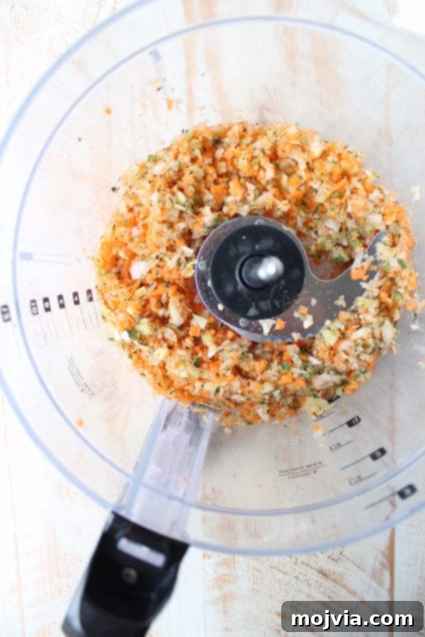 Savory Stuffing Biscuits 3 Finely chopped celery, carrots, and onions in a food processor, ready to be incorporated.