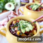 Fajita veggies, chili beans and fire roasted tomatoes create the most delicious vegetarian chili recipe, made in under 30 minutes!