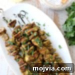 Fresh spinach, spices, lemon and olive oil are combined in an amazing marinade for these grilled Mediterranean Chicken Skewers!