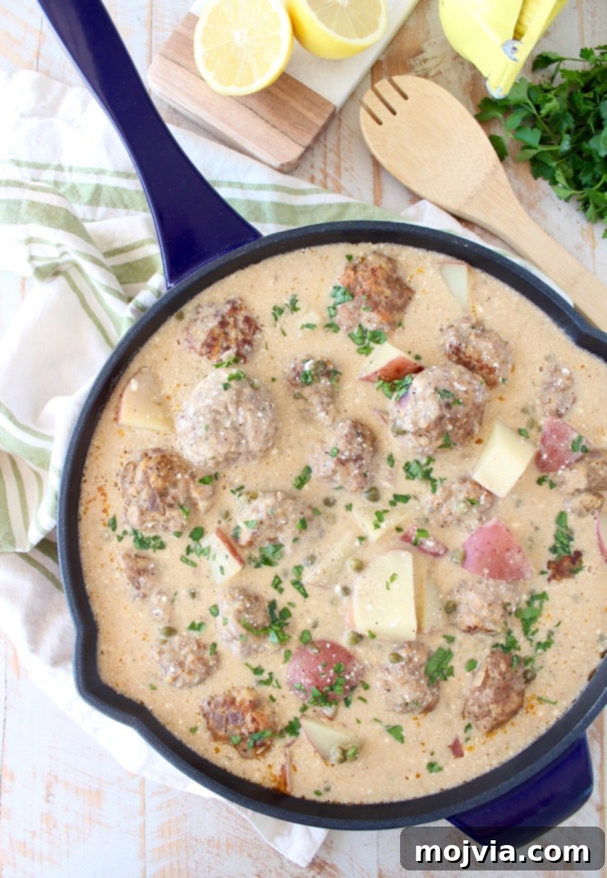 Hearty German Meatball and Potato Bake 2 A hearty one-pot meal featuring German meatballs and tender potatoes bathed in a rich, creamy white caper sauce, an easy and incredibly flavorful dinner.