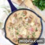 In one pot, create a delicious meal of German meatballs and potatoes in a creamy white caper sauce, incredibly flavorful and an easy dinner recipe!