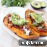 Deliciously easy Whole30 chipotle chili is added to these stuffed sweet potatoes for a scrumptious gluten free and dairy free meal, made in under an hour!