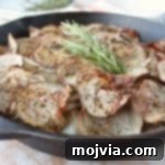 A small image showing the golden-brown crispy top of the Cast Iron Skillet Potatoes.