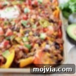 Mini Pepper Nachos with Ground Turkey, Beans, Tomatoes, Corn, Cheese and Avocado