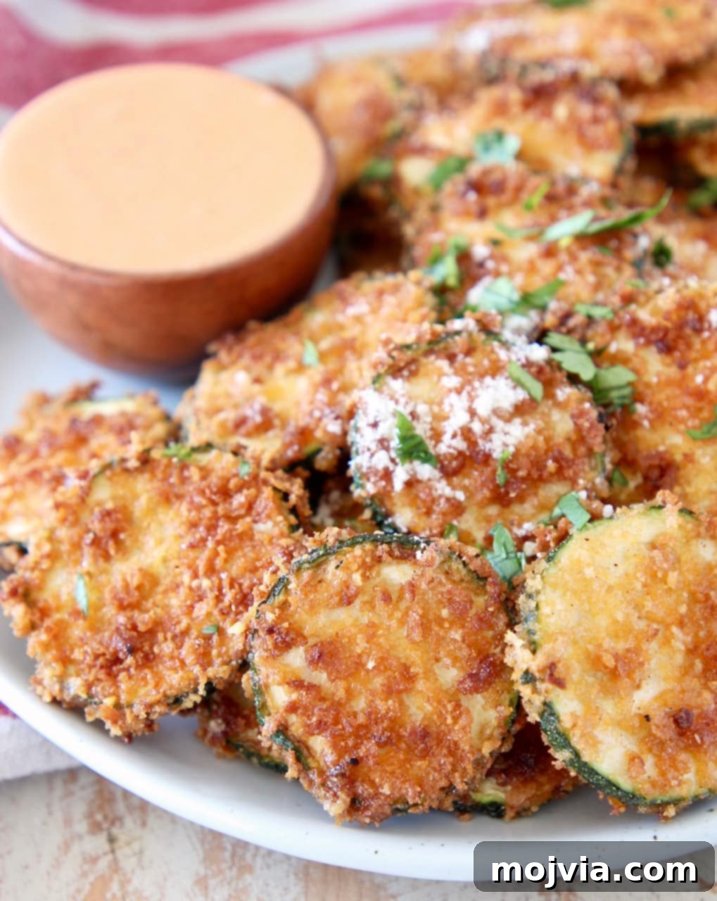 Spicy Buffalo Zucchini Crisps 2 Crispy Fried Zucchini Chips with Parmesan Cheese and Buffalo Blue Cheese Sauce