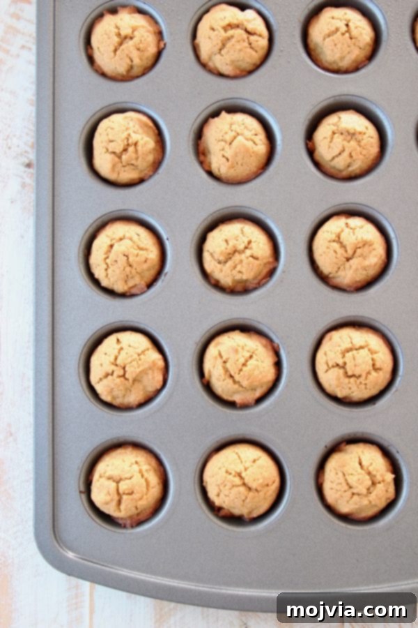 baked pumpkin cookies in mini muffin tin