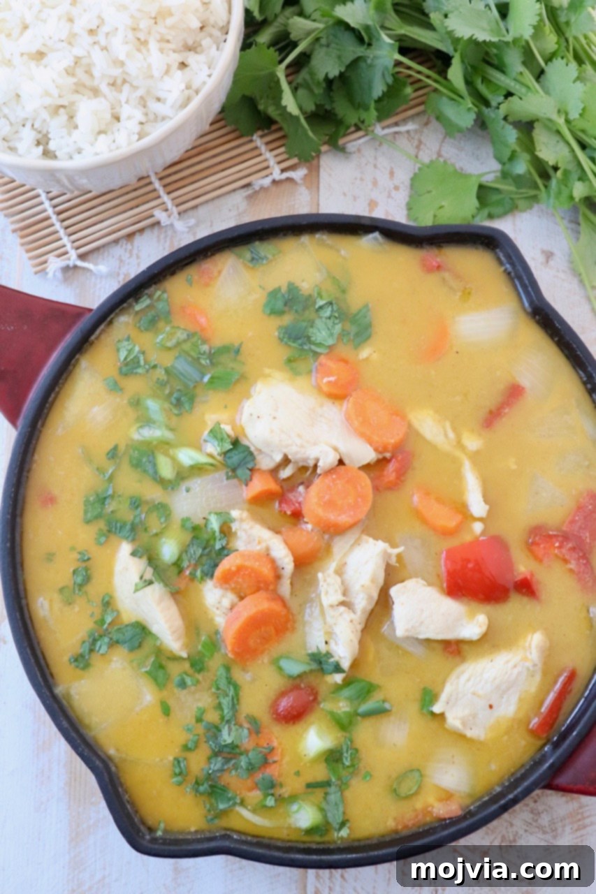 yellow curry chicken in skillet