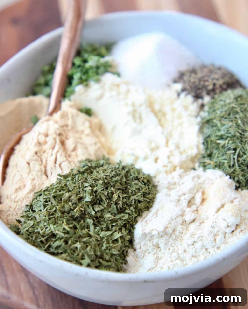 Ultimate Homemade Ranch Spice Blend 2 Ingredients for homemade ranch seasoning mix separated in a bowl