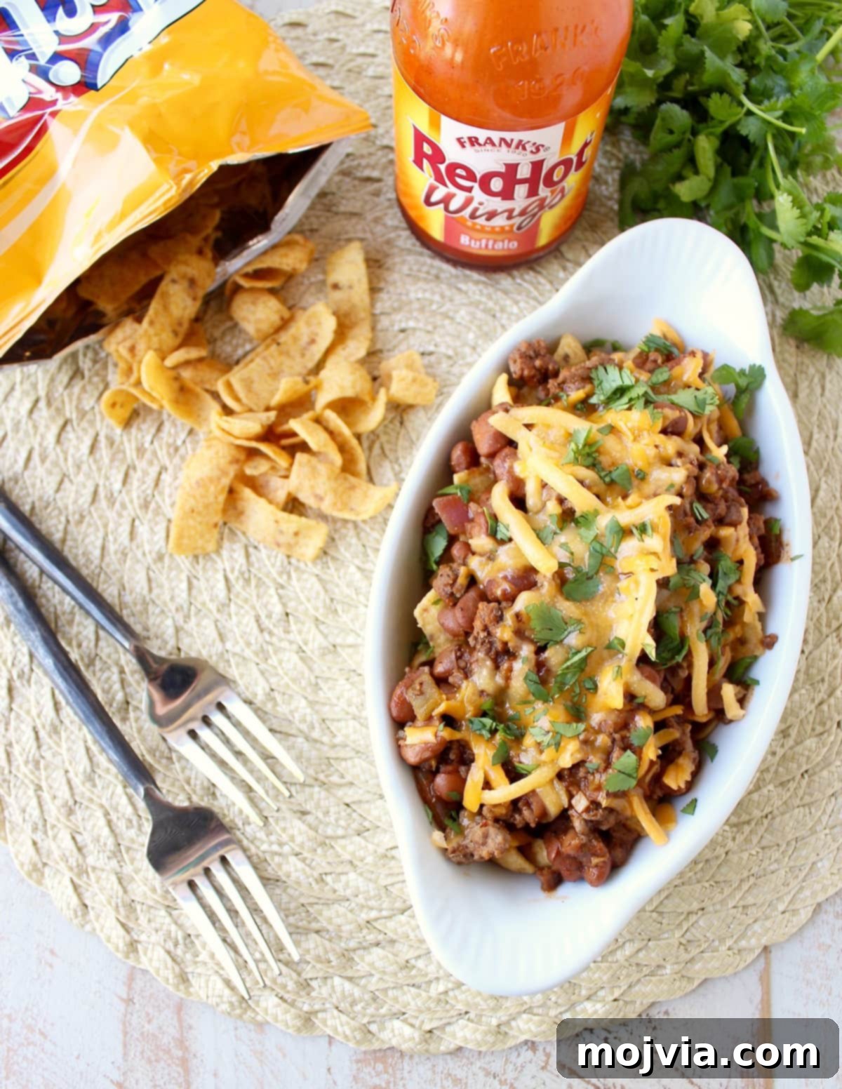 Pantry Power: Simple Recipes and Your Shopping List 15 Spicy Buffalo Frito Chili Pie, a delicious twist on a classic, ready in 20 minutes