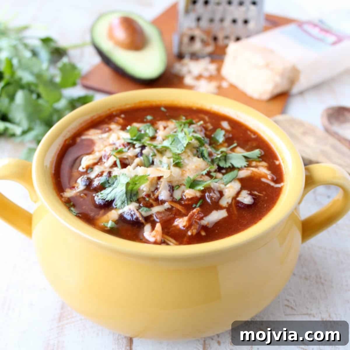 Pantry Power: Simple Recipes and Your Shopping List 6 This Slow Cooker Chicken Enchilada Soup recipe is quick to prep in 10 minutes and gets a spicy kick from Sriracha!