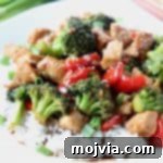 Teriyaki chicken and broccoli over rice on plate