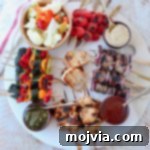 Grilled Bites Charcuterie Board 10 Overhead image of grilled skewers on charcuterie platter