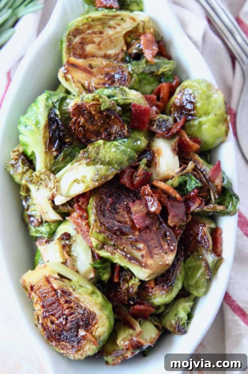 Roasted Maple Bacon Brussels Sprouts 6 overhead image of cooked brussel sprouts and bacon in serving dish