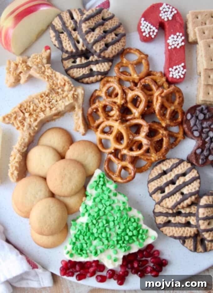 Festive Dessert Platter with Dreamy Cream Cheese Dip 8 Overhead image of holiday dessert board with pretzels and cookies