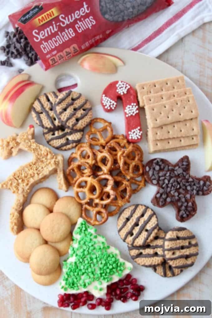 Festive Dessert Platter with Dreamy Cream Cheese Dip 10 overhead image of holiday dessert board with chocolate chips on the side