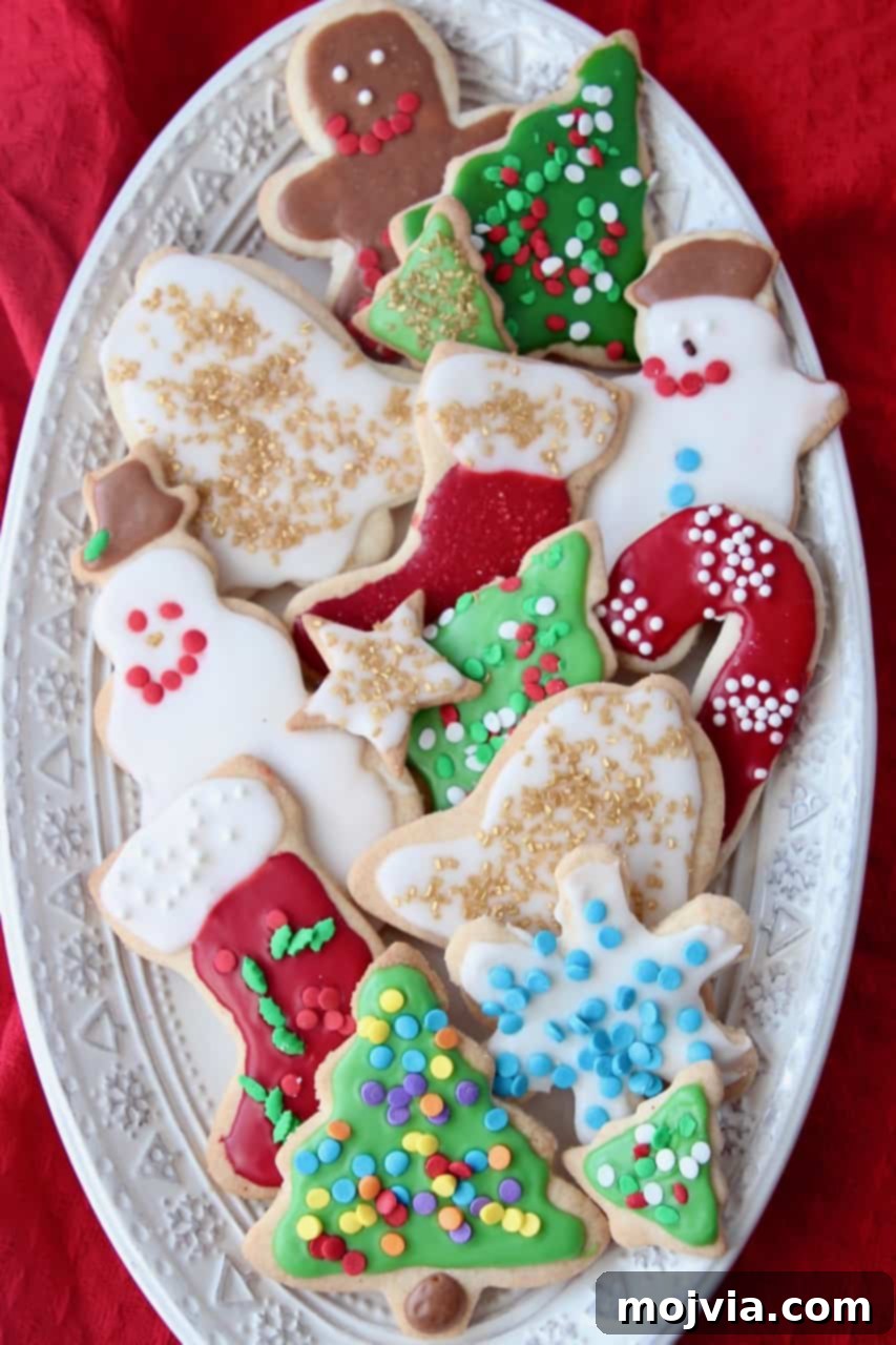 Overhead image of decorated sugar cookies on plate