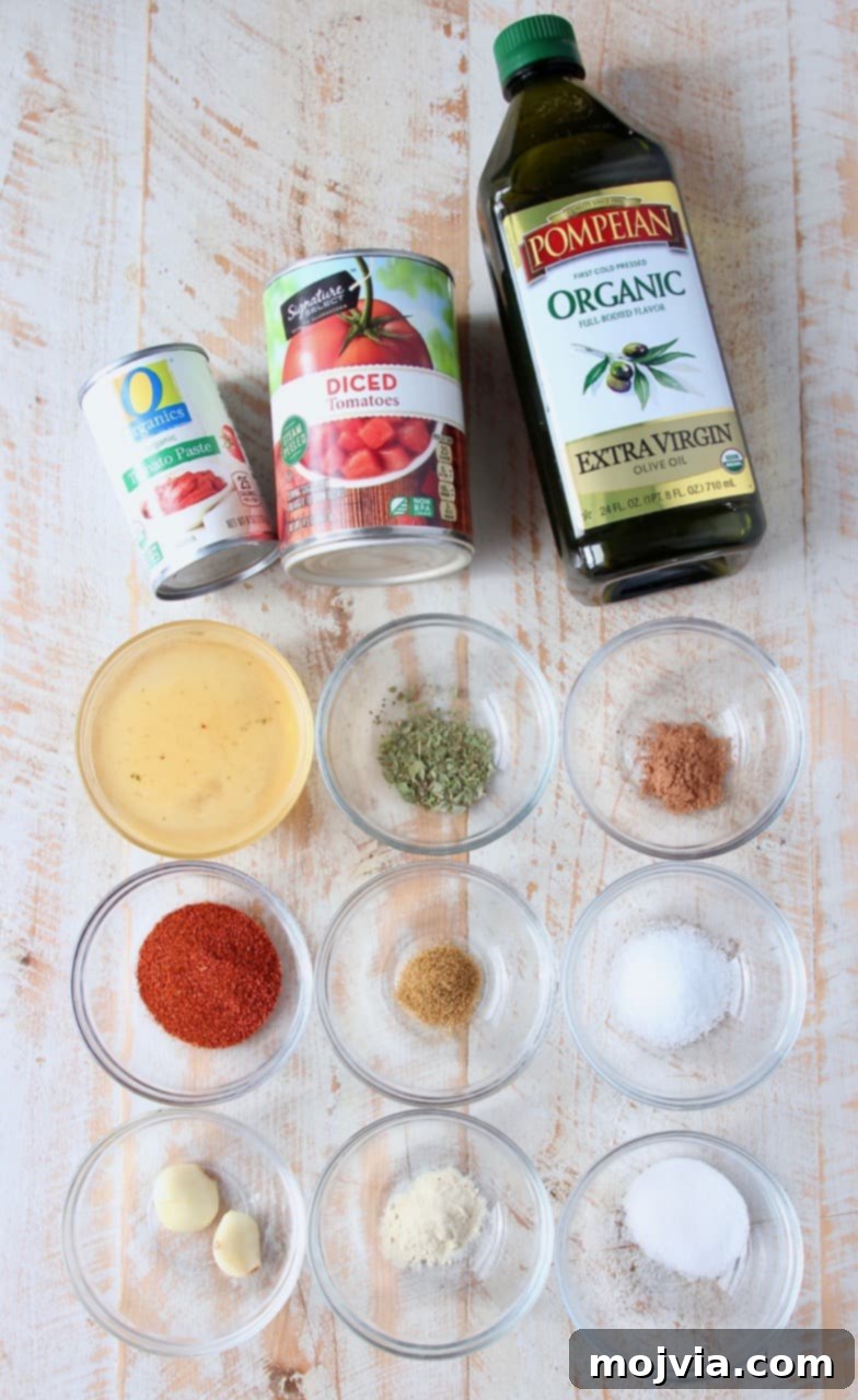 Classic Red Enchilada Sauce 3 overhead image of red enchilada sauce ingredients