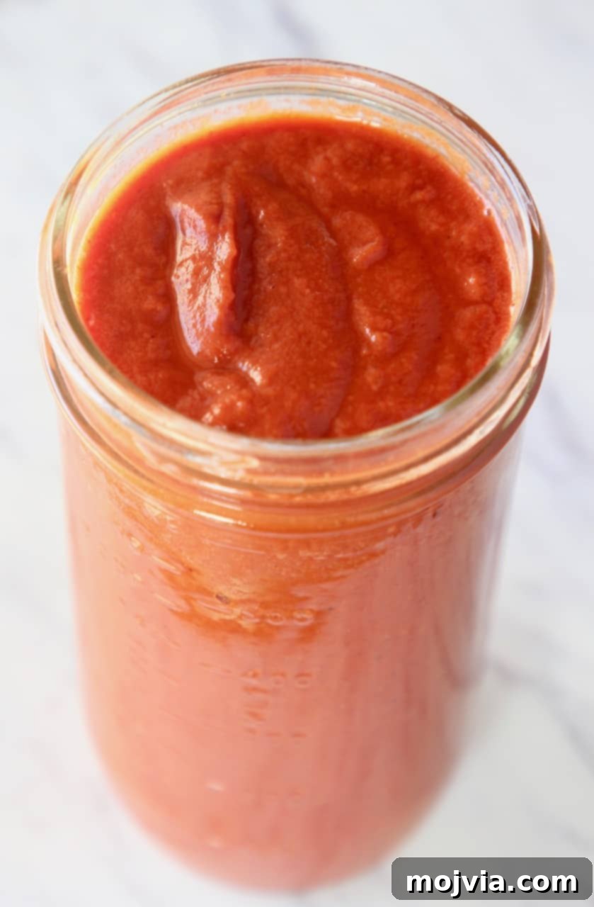 Classic Red Enchilada Sauce 7 red enchilada sauce in tall mason jar