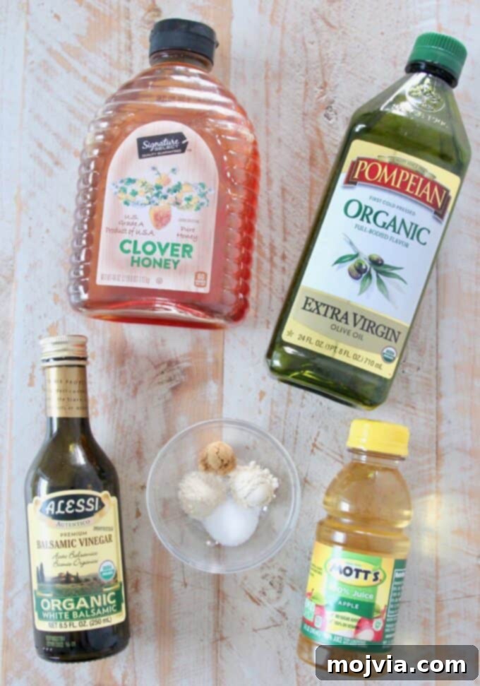 Bright Fuji Apple Dressing 3 Ingredients for Fuji Apple Salad Dressing laid out on a white surface