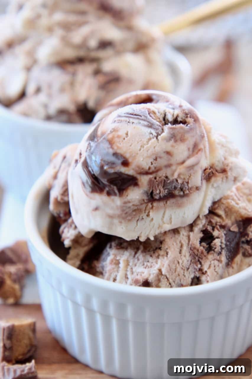 Decadent No-Churn Moose Tracks Delight 2 scoops of moose tracks ice cream in small white bowl