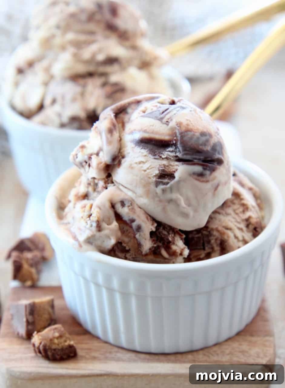 Decadent No-Churn Moose Tracks Delight 5 scoops of moose tracks ice cream in small white bowls with gold spoons