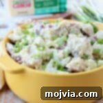 Quick and Creamy Instant Pot Cheddar Ranch Potato Salad 8 Instant Pot Potato Salad in a yellow bowl, ready to be served.