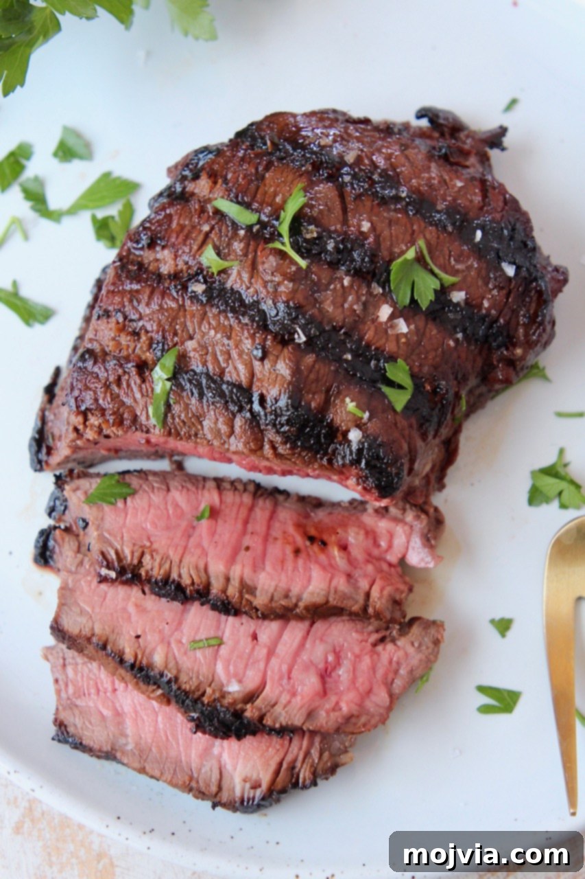 Sirloin Steak Marinade for Tender Perfection 7 grilled sliced sirloin steak on plate