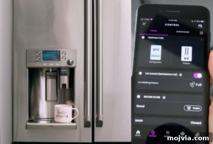 refrigerator next to phone with refrigerator app