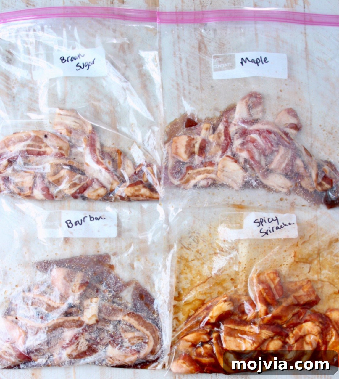 Pig Candy 3 Uncooked thick-cut bacon strips marinating in large zipper bags with various glazes: brown sugar, maple syrup, sriracha, and bourbon, ready for candying.