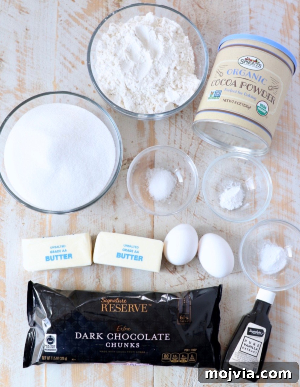 Ultimate Chocolate Treats 3 A flat lay photograph showcasing all the individual ingredients laid out for making delicious chocolate cookies.