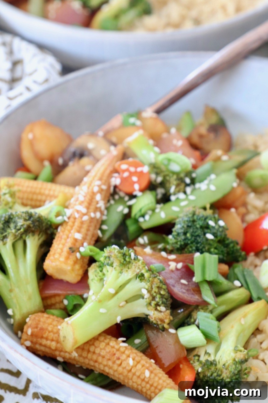 Vibrant Vegetable Stir-Fry 5 A bowl of freshly made stir fry vegetables with a fork, ready to eat