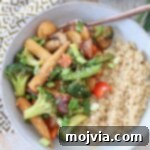 Vibrant Vegetable Stir-Fry 6 stir fry vegetables in bowl with rice and fork