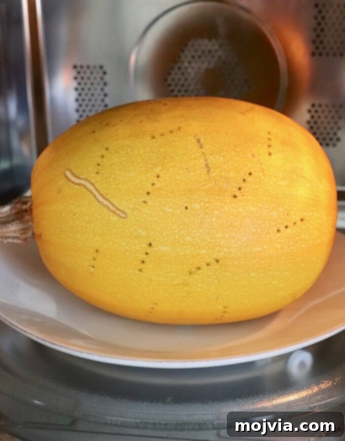 spaghetti squash on plate in microwave