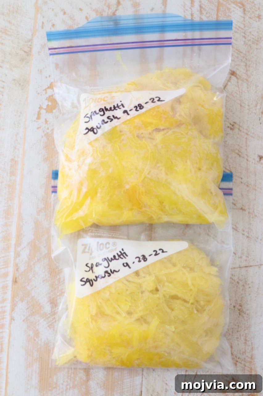cooked spaghetti squash strands in freezer plastic bags