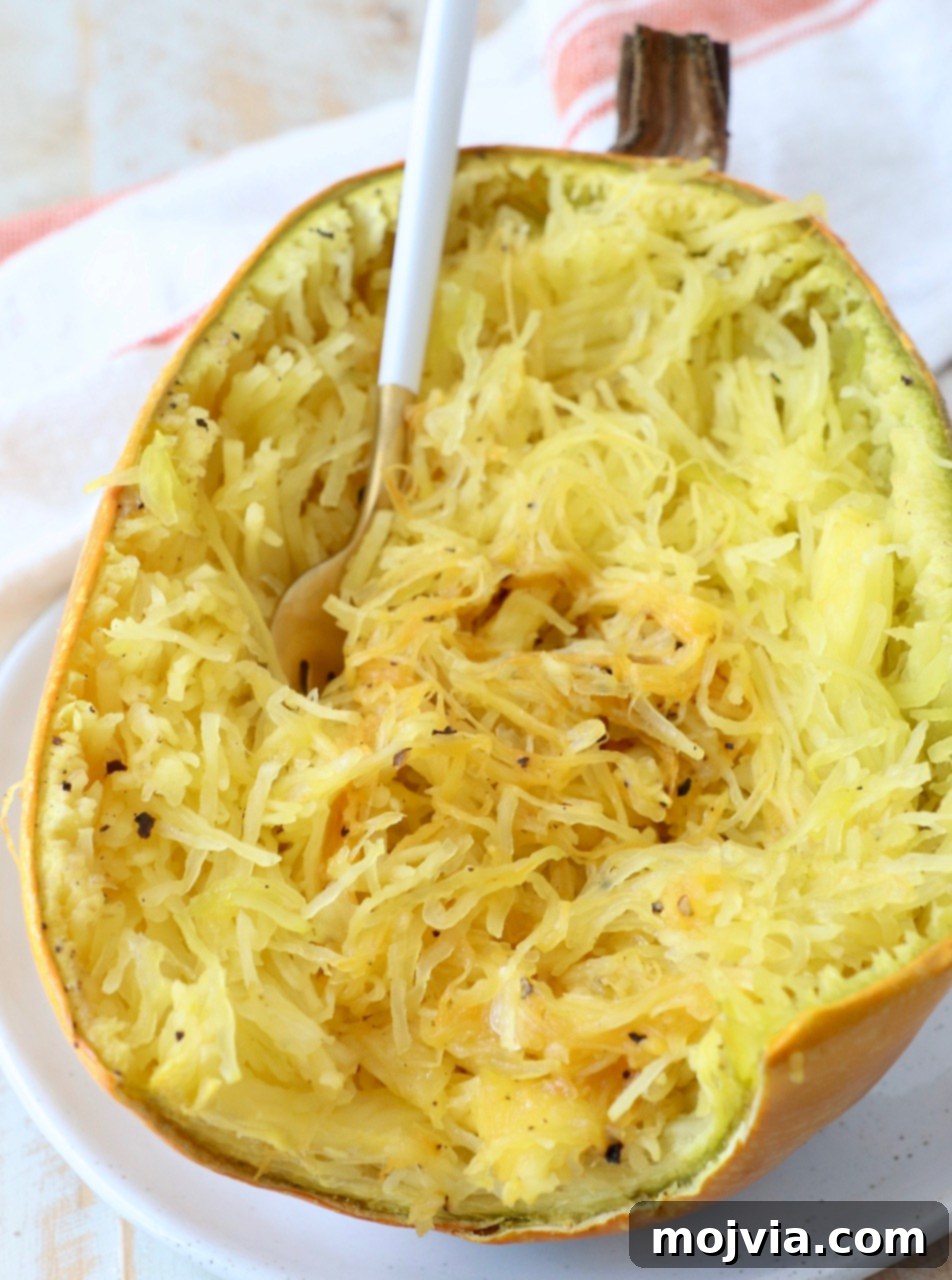 roasted spaghetti squash on plate with fork