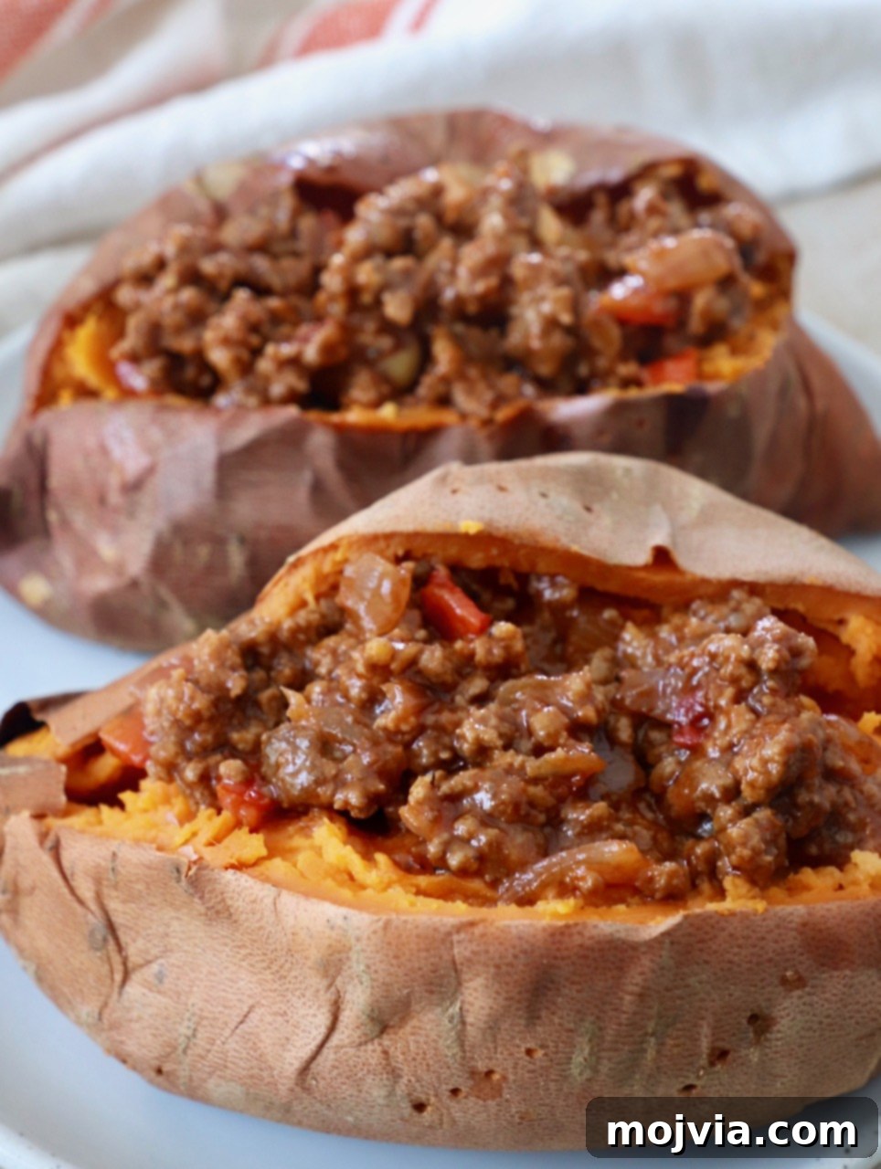 Sweet Potato Perfection Every Time 9 baked sweet potatoes generously stuffed with a savory sloppy joe filling