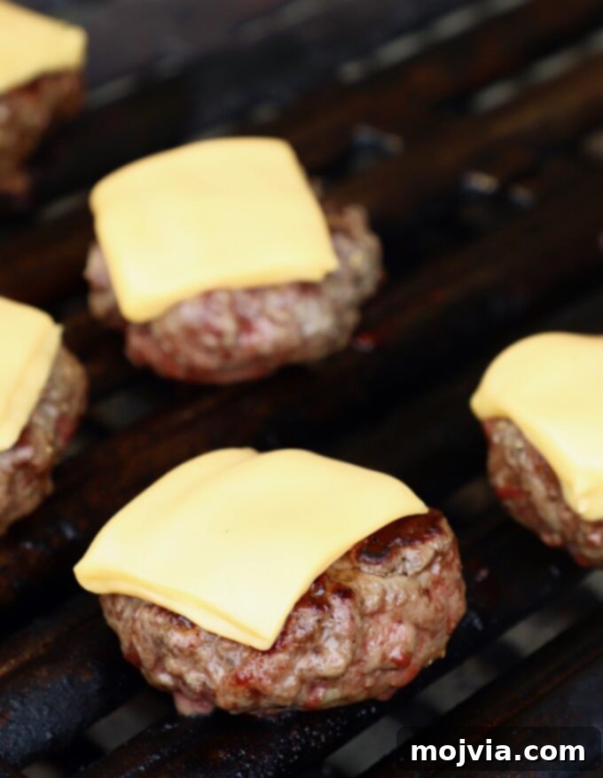 cheeseburger sliders on grill