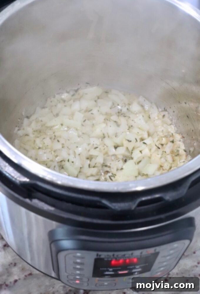 Quick & Creamy Instant Pot Risotto 4 diced onions and garlic in Instant Pot