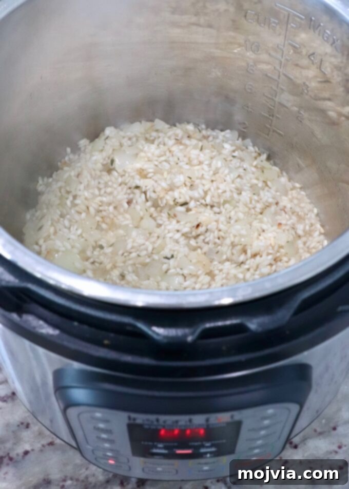Quick & Creamy Instant Pot Risotto 6 rice and onions in Instant Pot