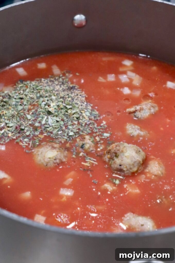 Ultimate Comfort Meatball Soup 5 meatball soup in pot
