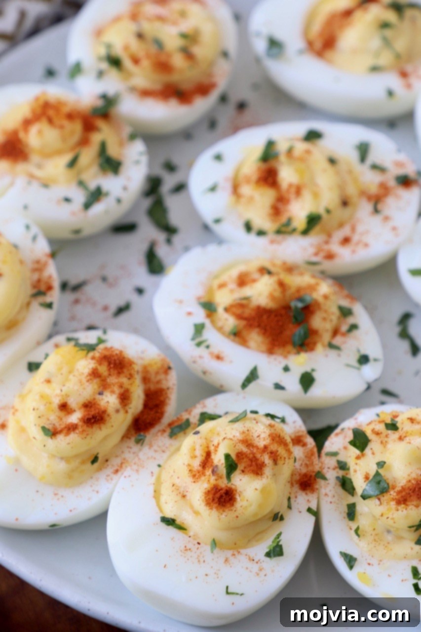 Family Favorite Deviled Eggs 9 prepared deviled eggs on plate
