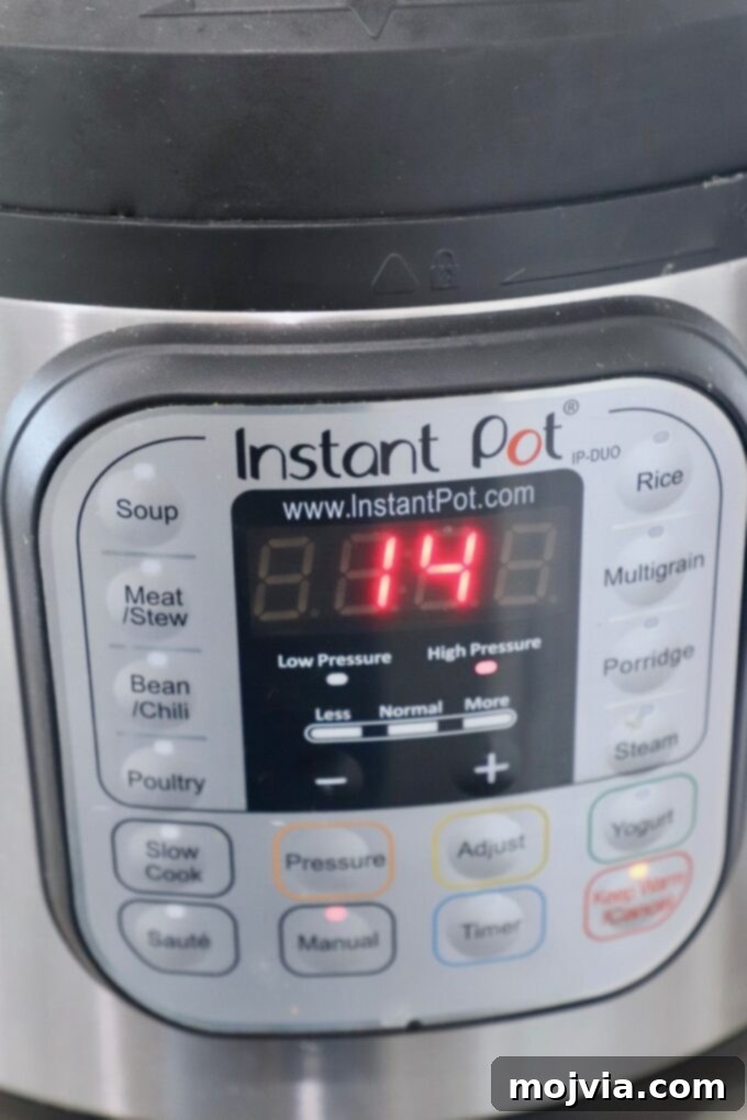 Perfect Instant Pot Baked Potatoes 4 Instant Pot displaying a cooking timer