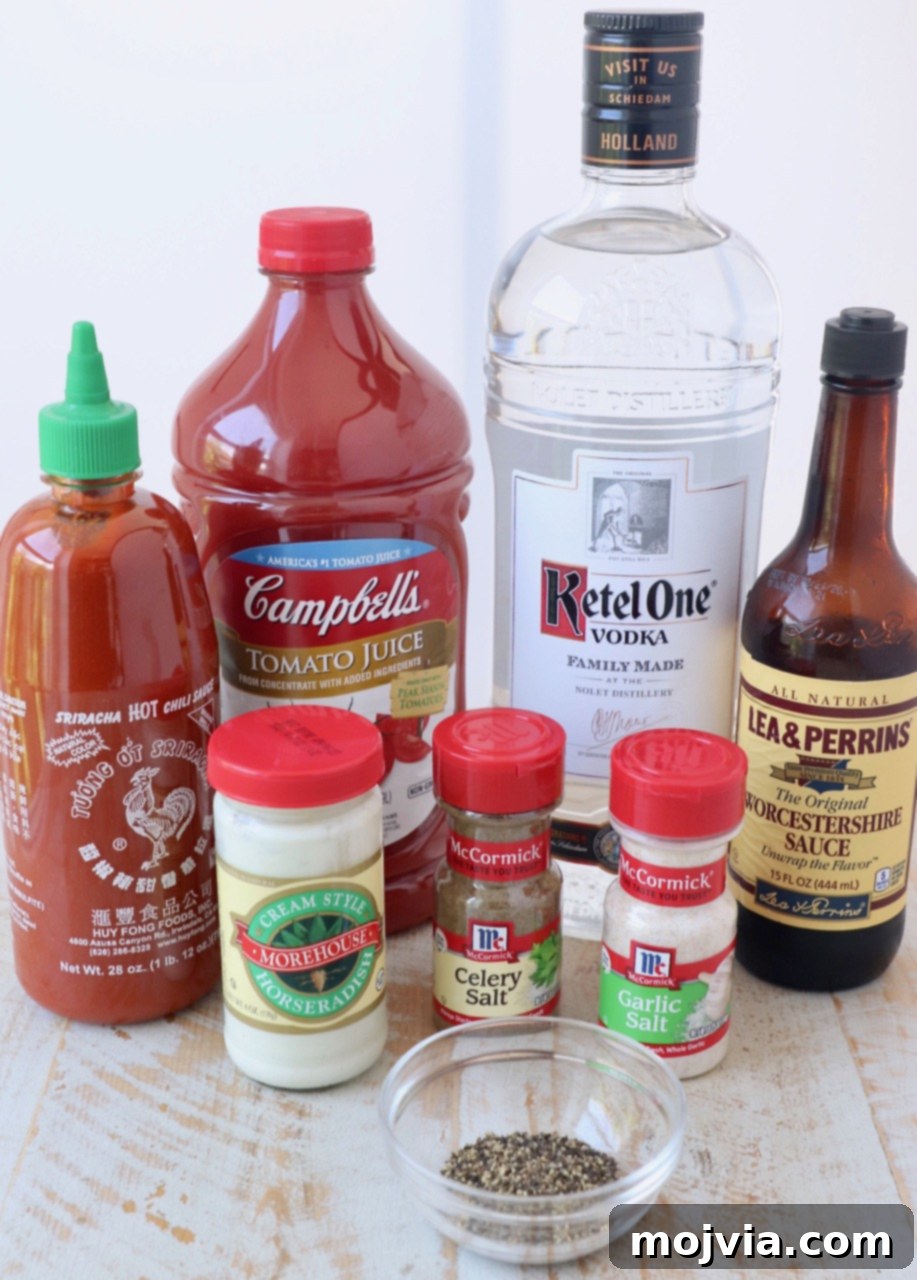 Selection of fresh ingredients for Bloody Mary mix including tomato juice, horseradish, and spices