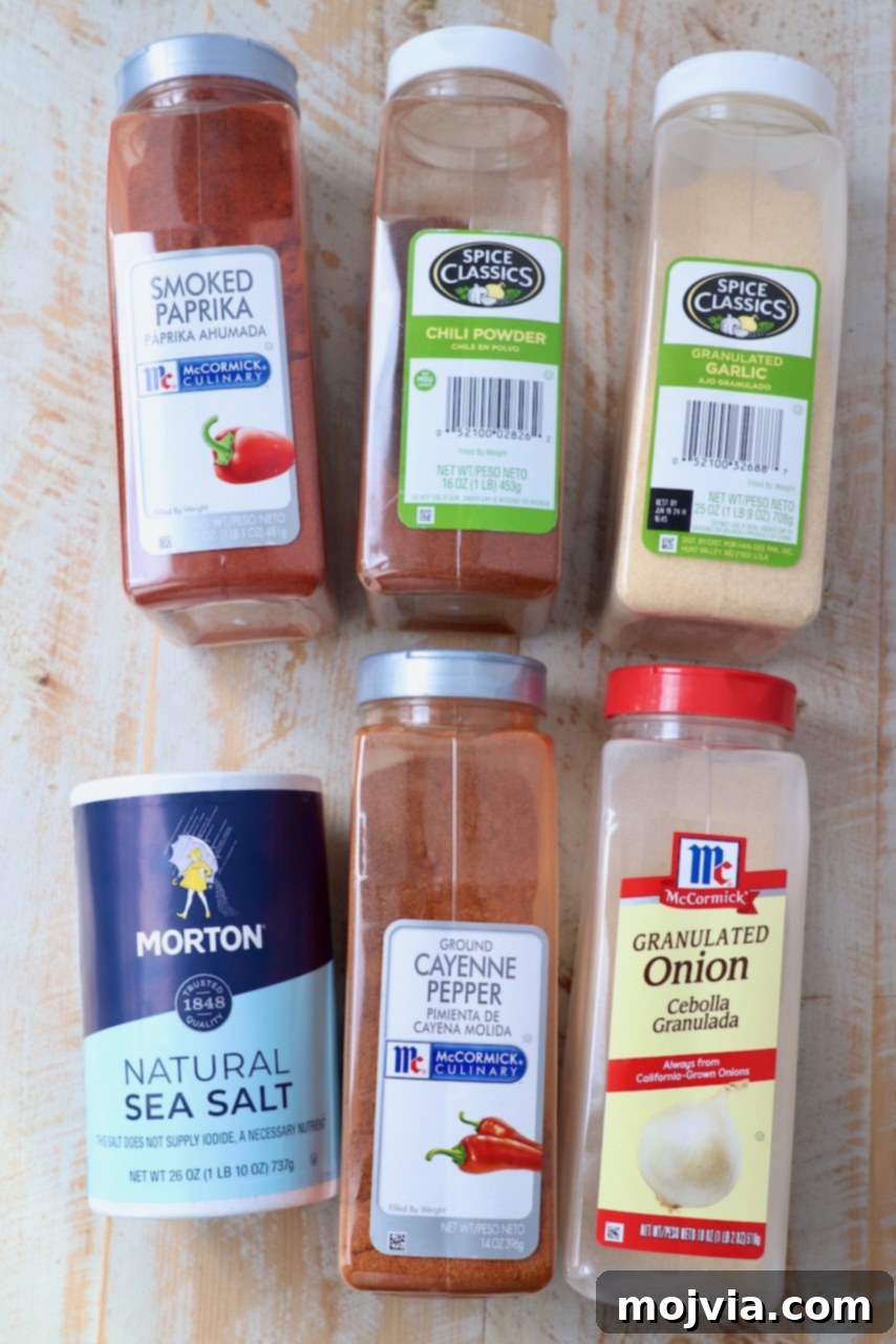 chicken wing seasoning ingredients on white wood board