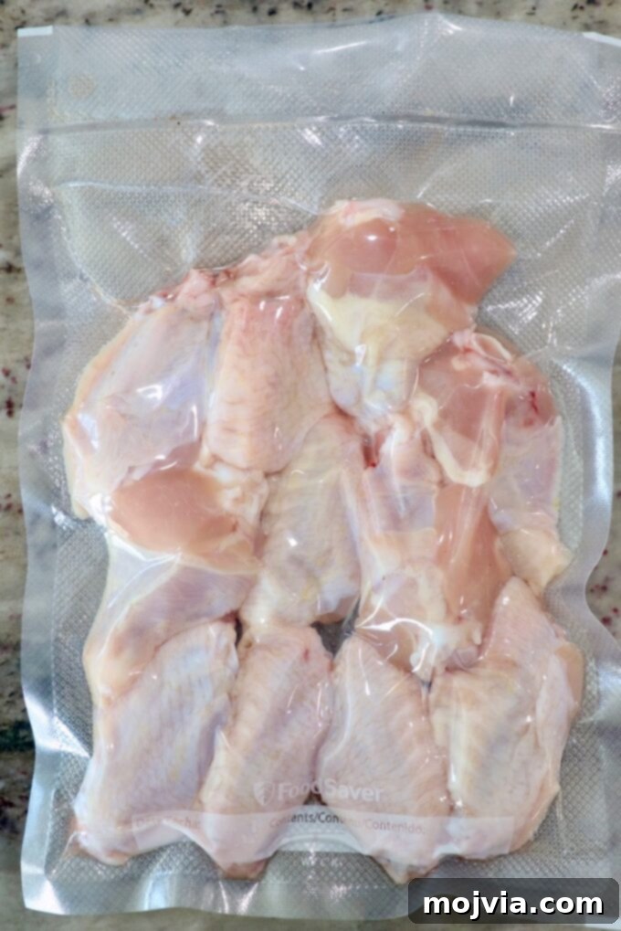 Sous Vide Wings: Crispy, Juicy Perfection 4 chicken wings vacuum sealed in bag