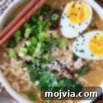 A enticing bowl of miso ramen noodle soup with chopsticks resting alongside, inviting a delicious meal.